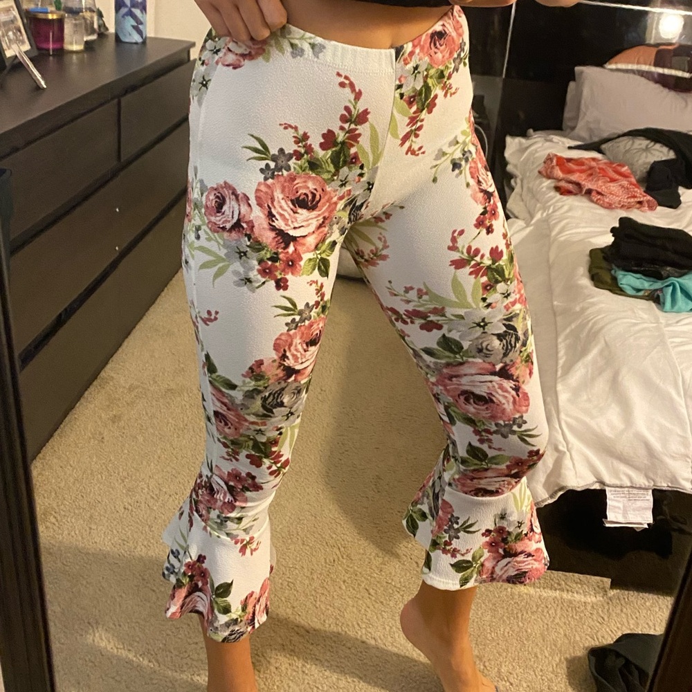 Flared pants with floral design